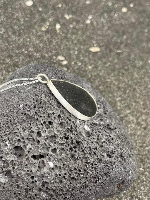 Handmade silver necklace with volcanic sand.