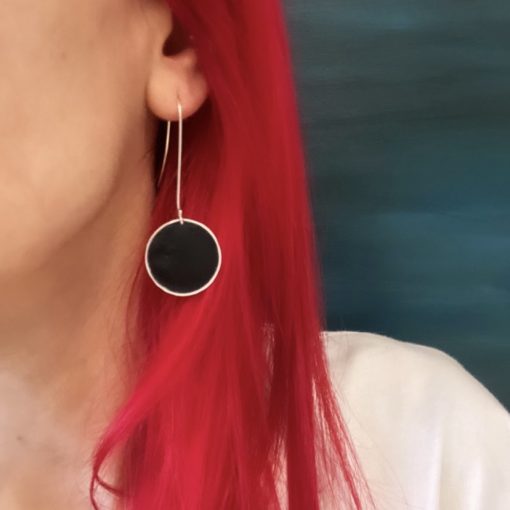 Handmade silver earrings with volcanic sand.
